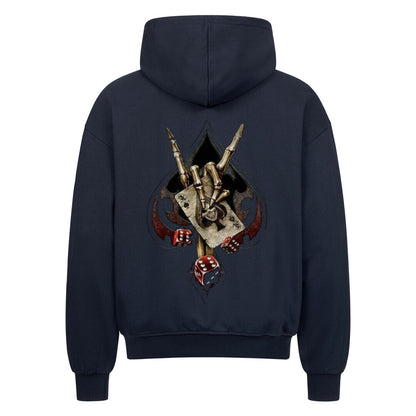 Back view of a french navy hoodie featuring a bold biker-themed backprint with a skeletal hand throwing the horns, playing cards, dice, and spade symbol – worn by rebellious streetwear fans.

