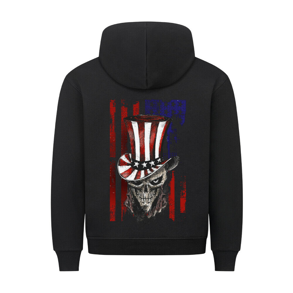 Black hoodie with a large backprint of a grinning skull wearing an American top hat, set against a grungy red and blue USA flag background.