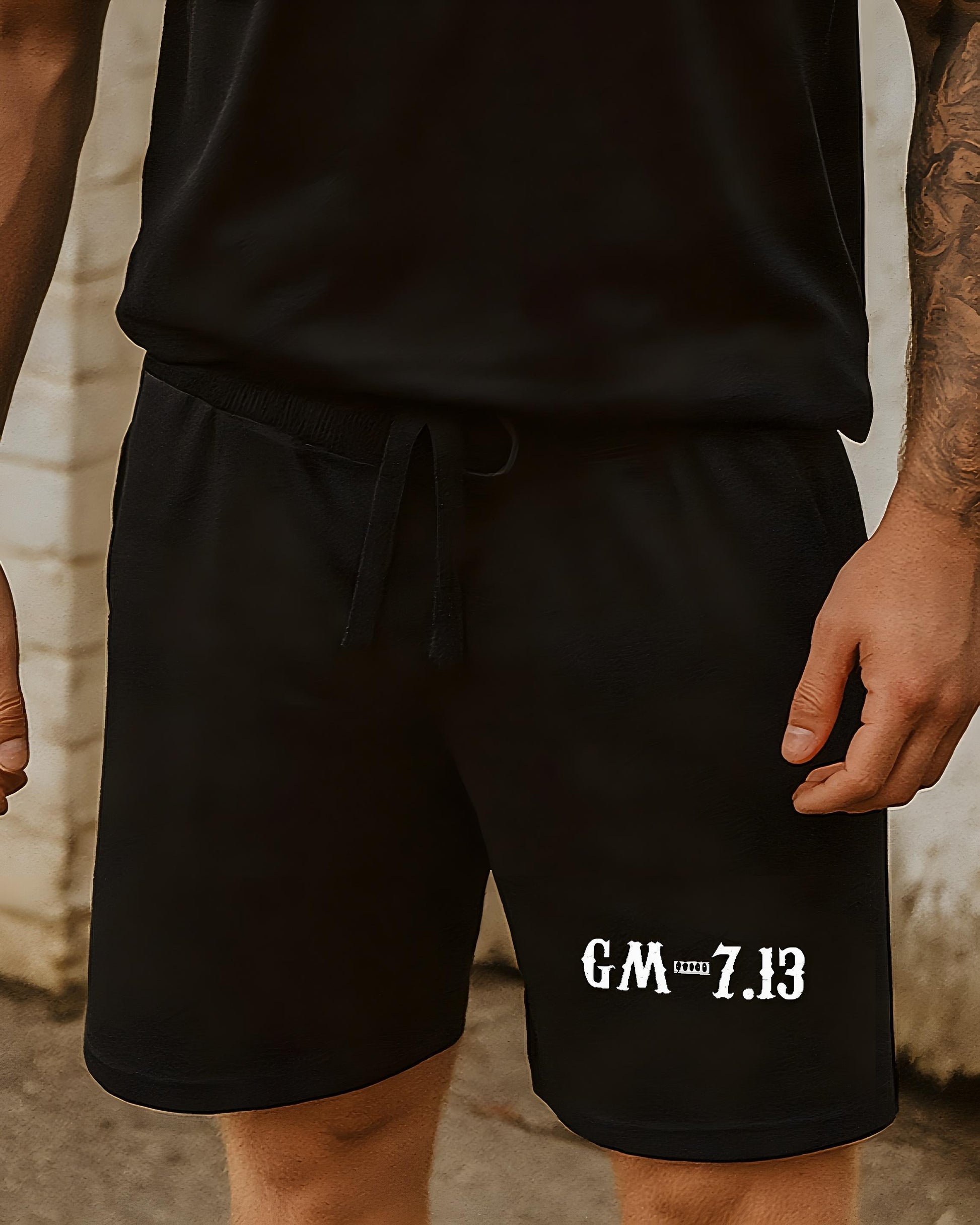 Black unisex shorts with GM 7.13 print on the leg. Heavy cotton streetwear style by Gas Mavericks, ideal for bikers and muscle car fans.